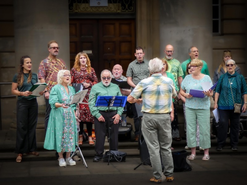 (1) Singing in Peterborough City Centre August 2024 [Photo courtesy of Dene Butler]
